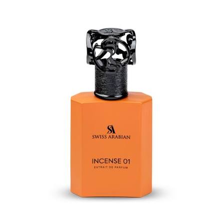 Incense 01 Extrait de Parfum i en oransje glassflaske med dekorativ svart kork.